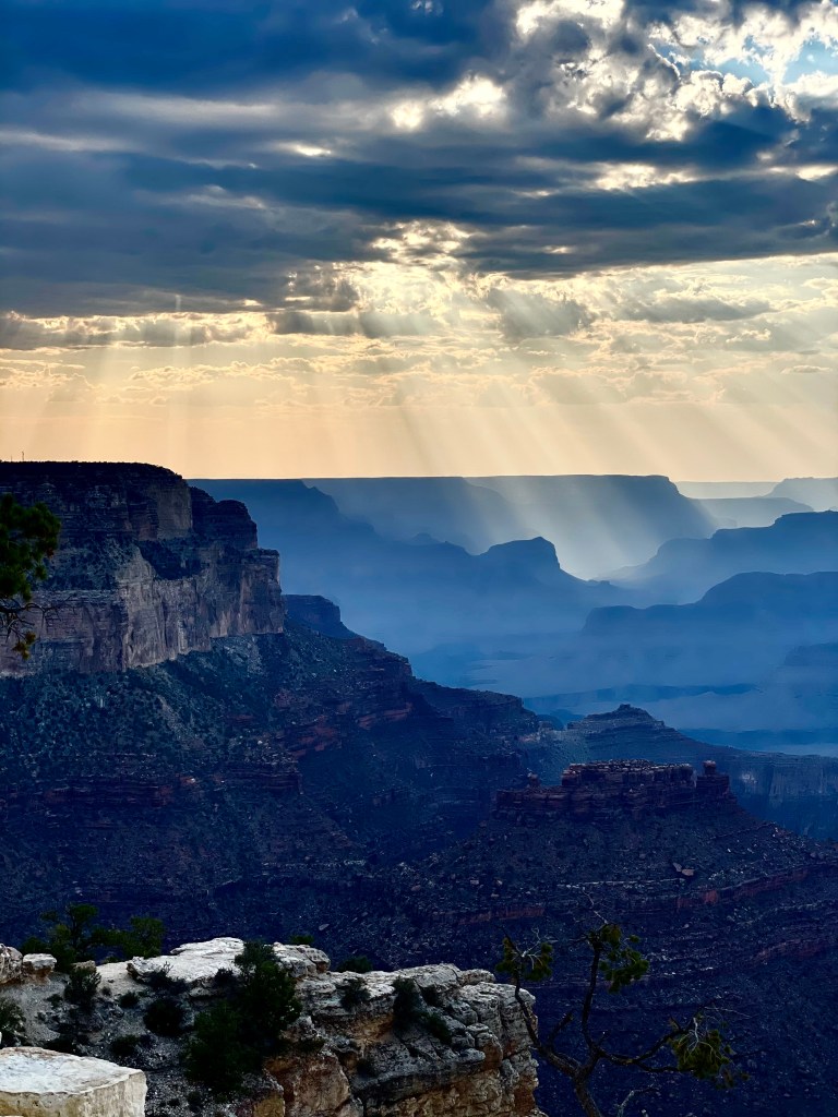 I took this shot watching the sun set over the Grand Canyon.  I love sunrays, and the contrast between the deep blues of the landscape and the bright light was captivating.  The Grand Canyon is definitely the best "Stand Alone."
