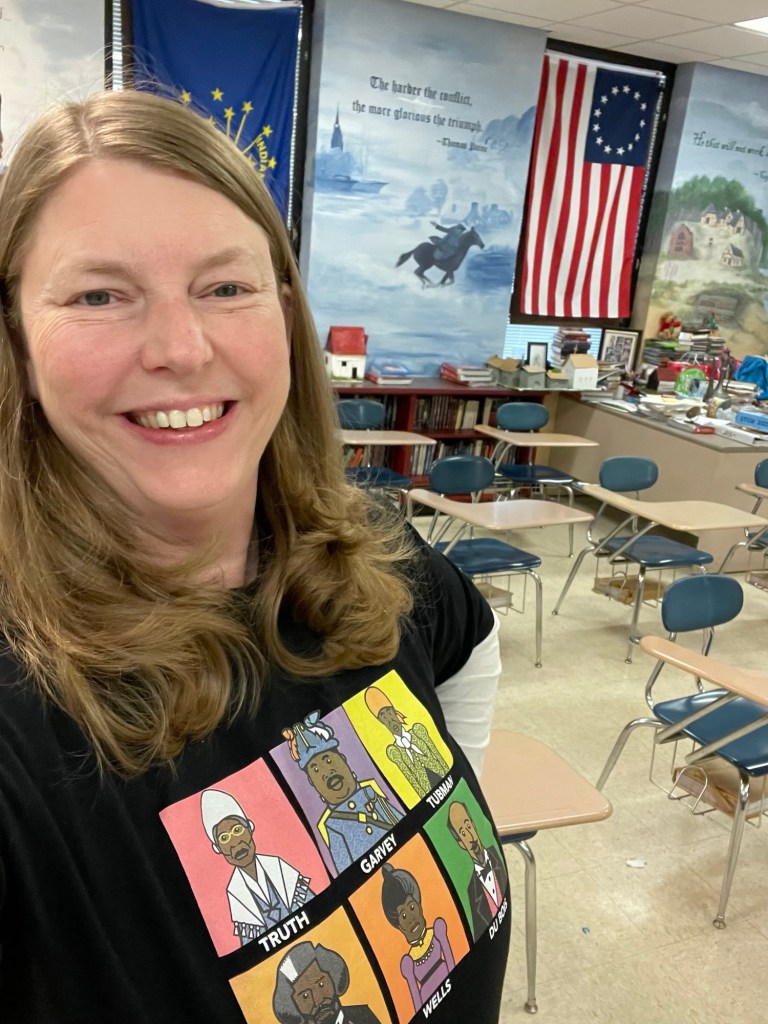 This is my in my classroom. I hate white walls, so my mom and I painted a timeline with quotes.